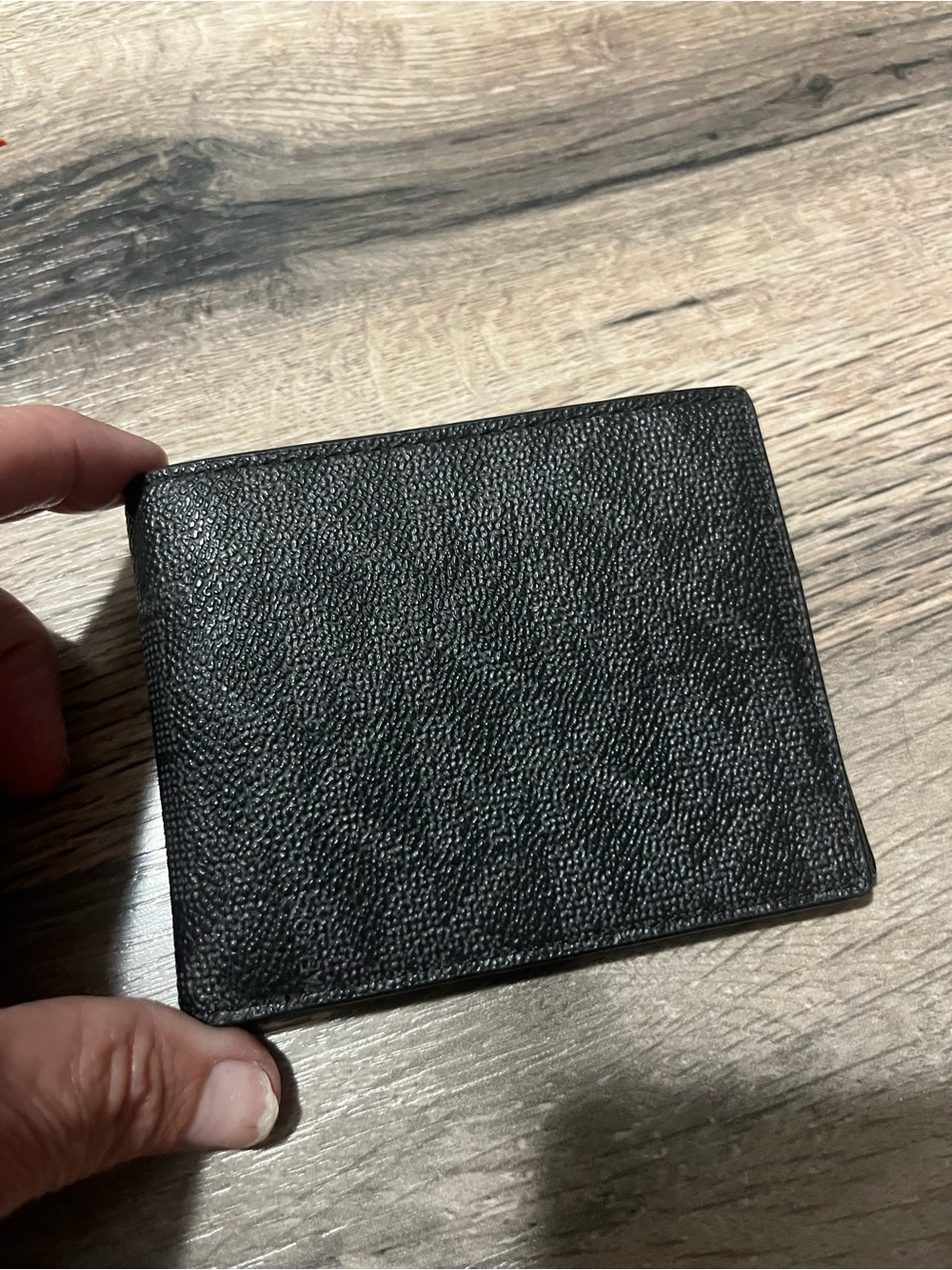 Michael Kors Men's Black Textured Leather Bi-Fold Wallet